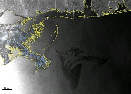 In this radar image, acquired from Envisat's Advanced Synthetic Aperture Radar (ASAR) on 2 May 2010 03:45 UTC (Saturday night local time), the oil spill is visible due east of the Delta National Wildlife Refuge extending into the Gulf of Mexico. The white dots are oil rigs and ships. Radar is especially suited for detecting oil spills. ESA