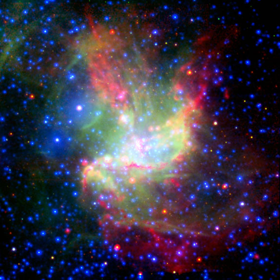 Esta imagen de una nube incubadora de estrellas, fue compuesta por varias imagenes de diversos telescopios, incluyendo el XMM-Newton [Créditos: ESA XMM-Newton/EPIC]